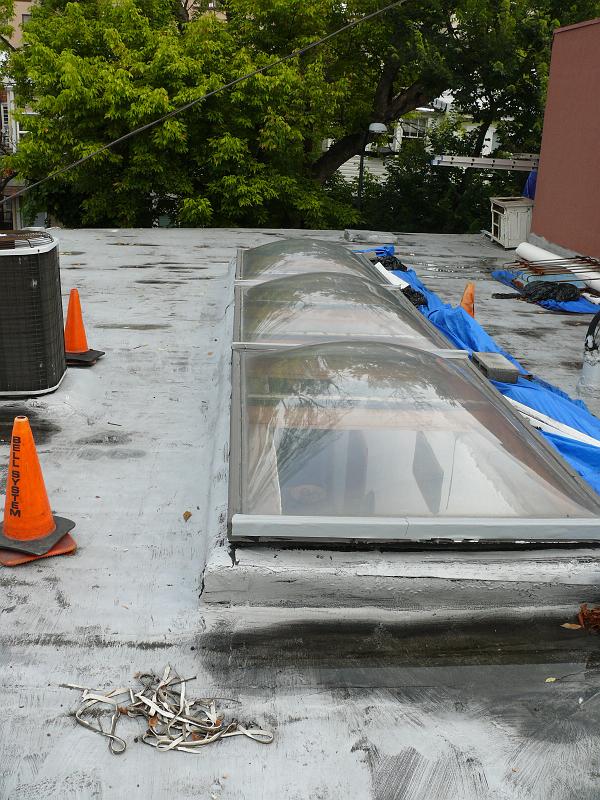 P1150635.JPG - Another neighbor's unshaded skylight.  This is a popular two layer plastic skylight that has a rather low R value and blocks little UV.