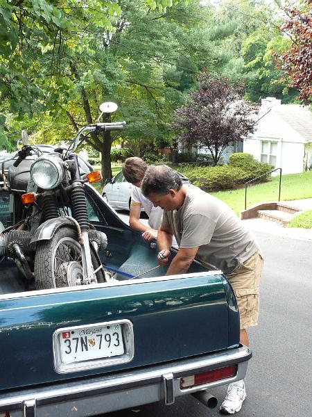 P1150479.JPG - Woody strapping the bike in.