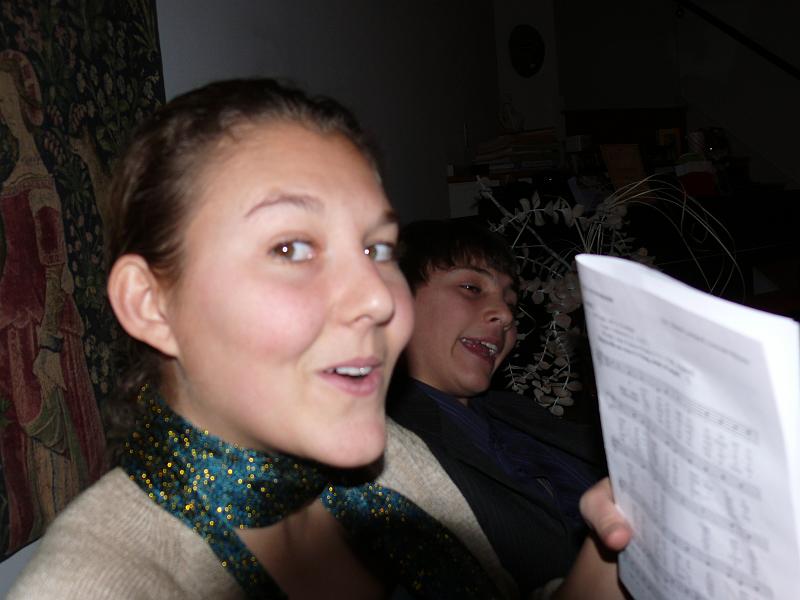 P1160023.JPG - Miss Amelia and David brought the carols home from church.  What they lacked in pitch they made up for with enthusiasm.