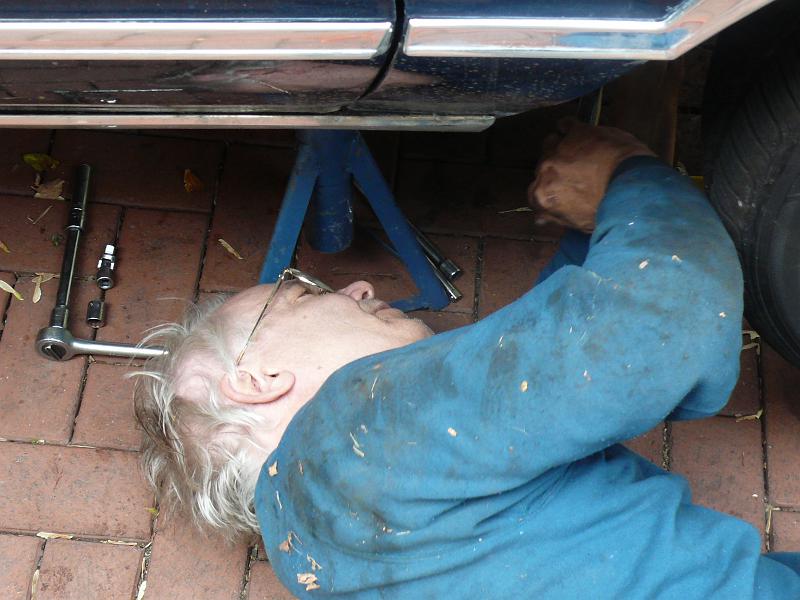 P1170776.JPG - The exhaust bolts were a problem.  At first Win though he could remove the engine with the crossover pipe, but it turns out that would not work.
