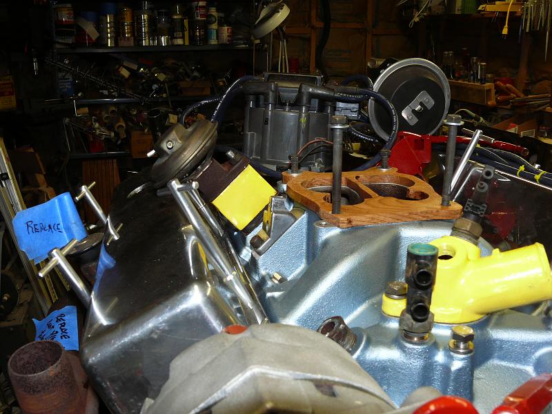 P1180159.JPG - The oak carburetor insulator.