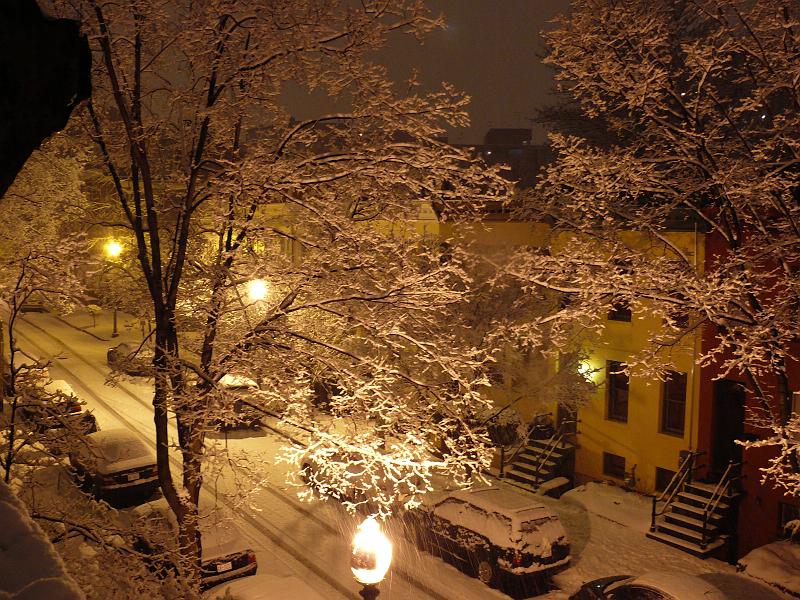 P1160090.JPG - Night time view of Newport Place from Win's roof as the snow begins.  Looking East.