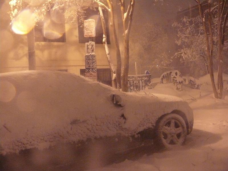 P1160100.JPG - Win & Michele's car -- before the tree came down.  Woody was knocking snow off the tree limbs with a 15 foot long plastic pipe.